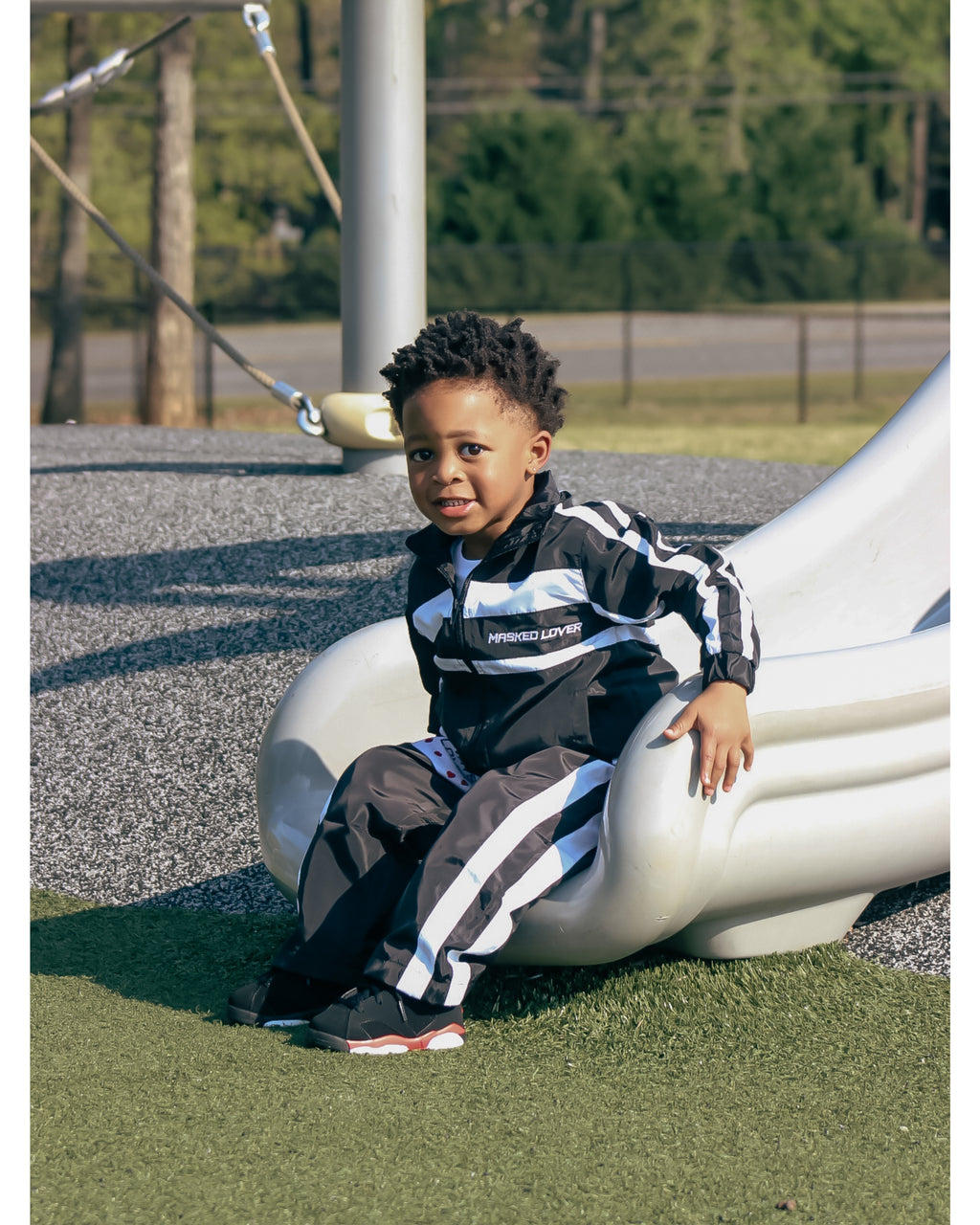 Black kids streetwear tracksuit set by Masked Lovers