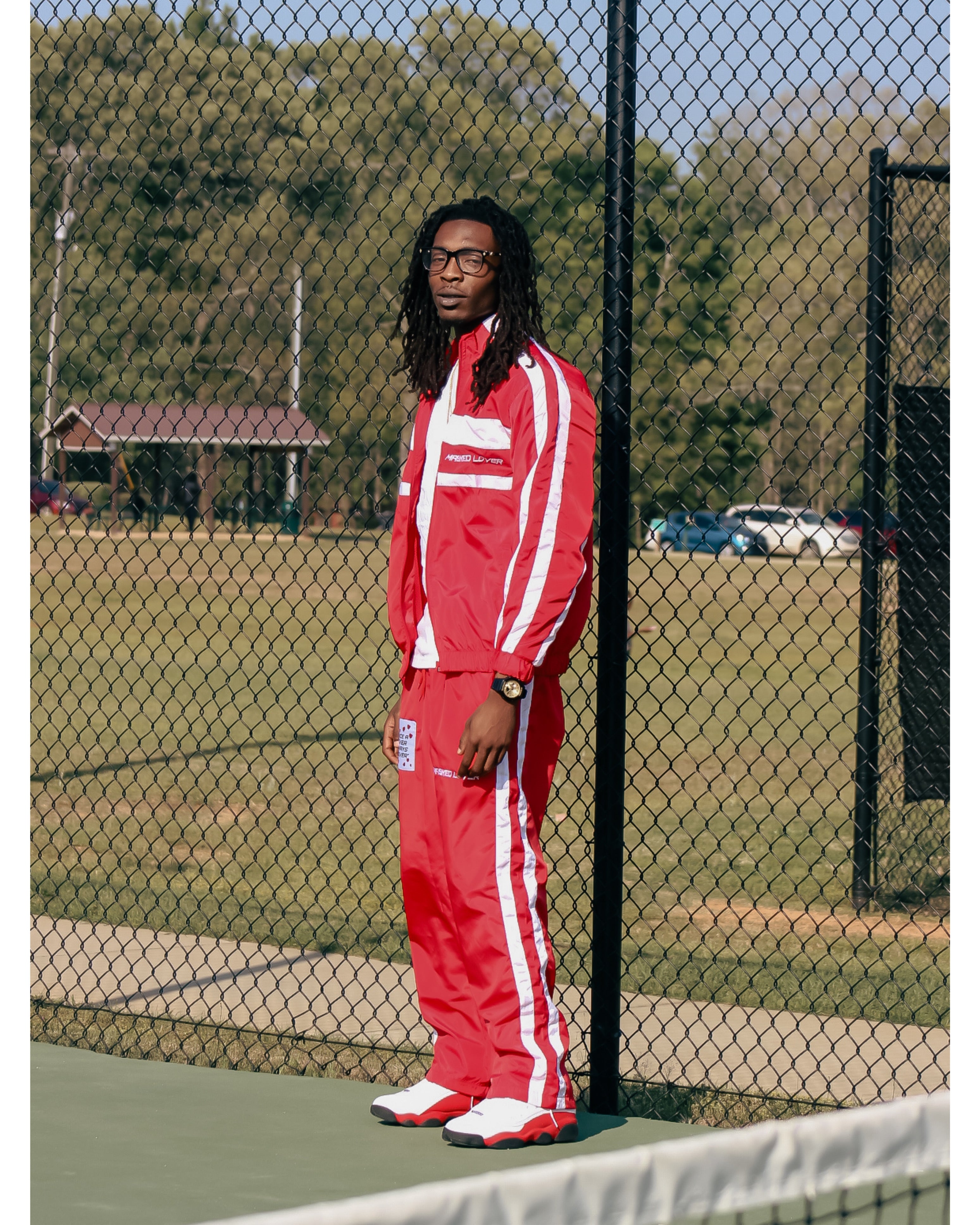 Red streetwear tracksuit set by Masked Lovers